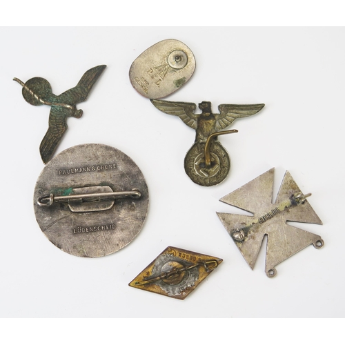 968 - A Third Reich period armband, a silver Maltese cross brooch/pendant, coin brooch, and other badges.