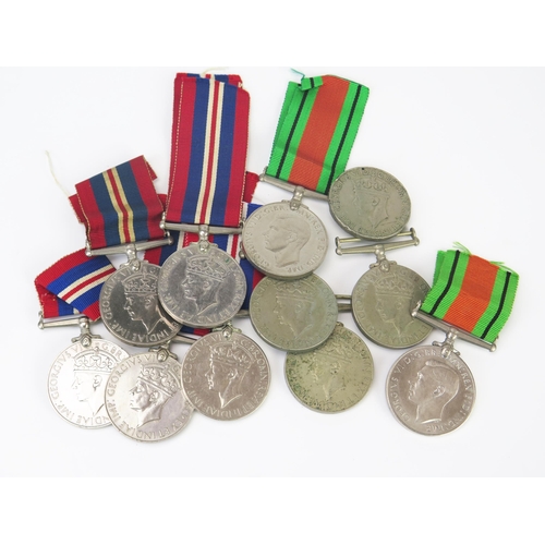 980 - Nine 1939-45 War Medals, and two Defence Medals, (11).