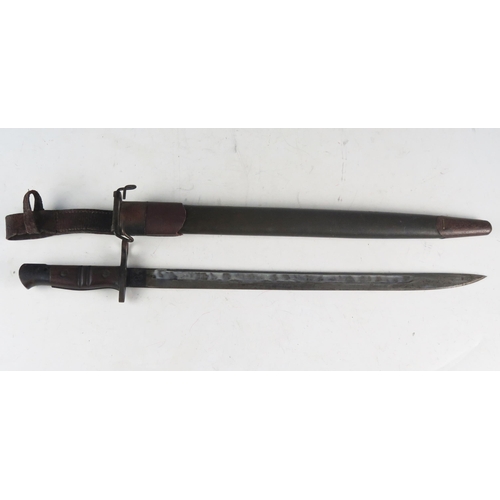 991A - A World War I American issue bayonet, with 43cm fullered blade, stamped marks, with ribbed wood slab... 