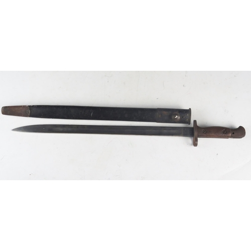 992 - A British World War One 1907 pattern bayonet, with 43cm fullered blade, and wood slab grip in leathe... 