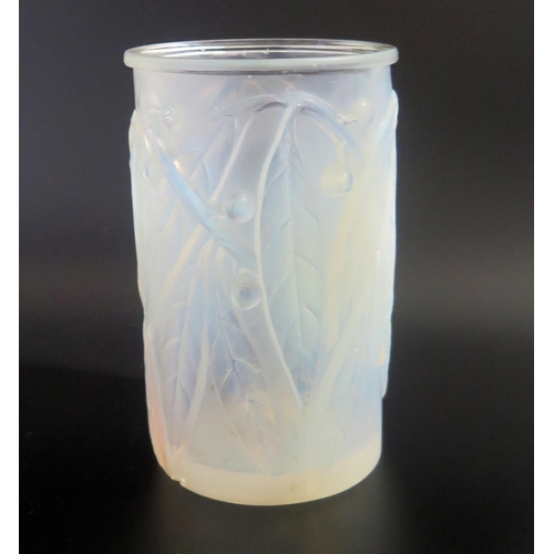 1290 - A Lalique opalescent glass 'Leaf & Berry' pattern vase.  Signed R Lalique, France close to the base,... 