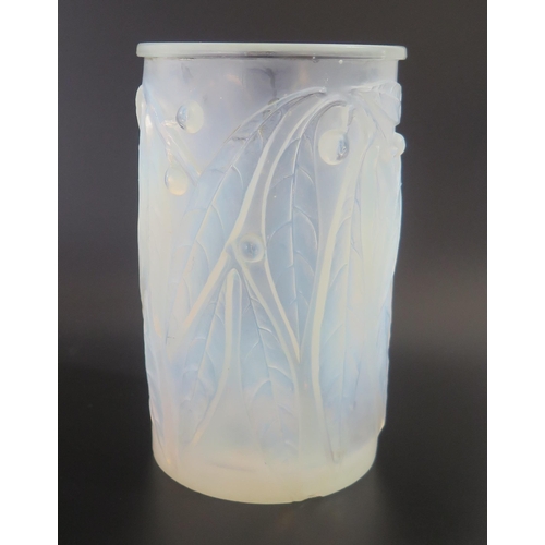 1290 - A Lalique opalescent glass 'Leaf & Berry' pattern vase.  Signed R Lalique, France close to the base,... 