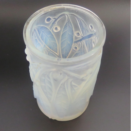 1290 - A Lalique opalescent glass 'Leaf & Berry' pattern vase.  Signed R Lalique, France close to the base,... 