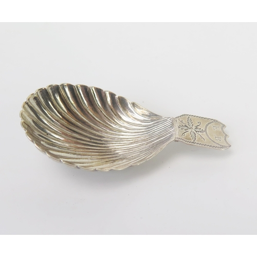 666 - A George III silver caddy spoon, maker Matthew Linwood, Birmingham, 1807, initialled with shell-shap... 