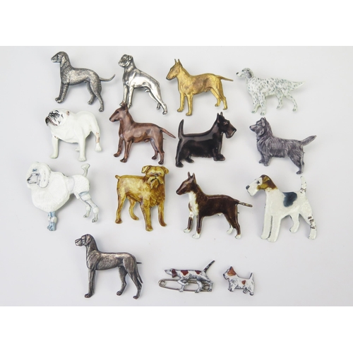 674 - A collection of silver and silver and enamelled dog brooches, various breeds, (14).