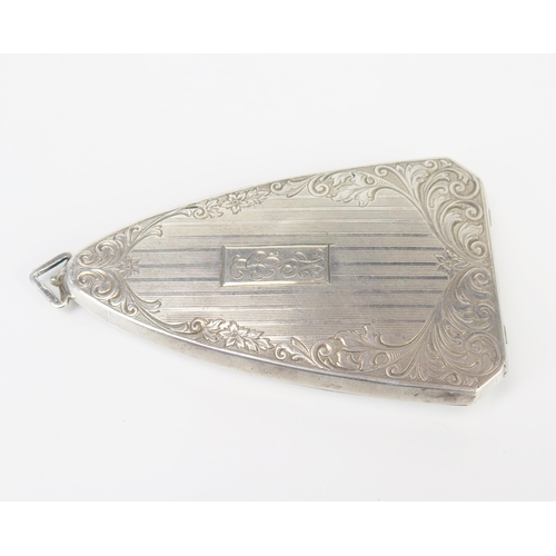 675 - A Sterling silver combination sovereign and stamp case, of triangular form, initialled and dated 192... 