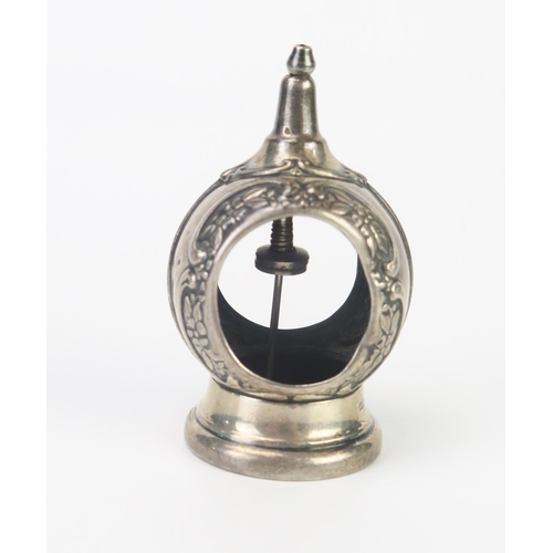 676 - A silver string holder, all marks worn and rubbed. of domed outline on a circular tortoiseshell base... 