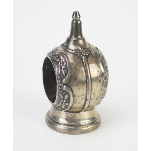 676 - A silver string holder, all marks worn and rubbed. of domed outline on a circular tortoiseshell base... 