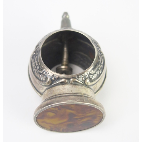 676 - A silver string holder, all marks worn and rubbed. of domed outline on a circular tortoiseshell base... 