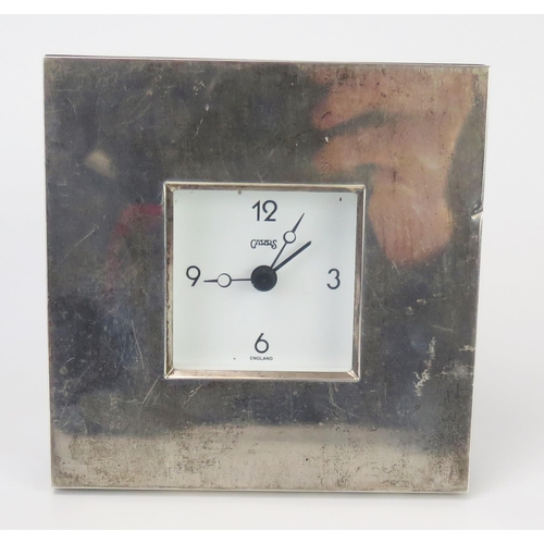 682 - An Elizabeth II silver framed  timepiece, maker RC, Sheffield, 2001, of square outline, with battery... 