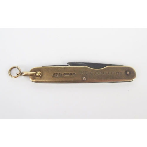 847 - A 9ct gold and steel framed folding penknife, inscribed.