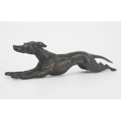 848 - A bronze model of a greyhound running at speed, unsigned, 12cm long