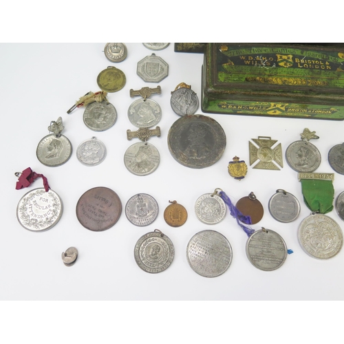 850 - A collection of 19th century and later bronze and metal commemorative medallions contained in two me... 