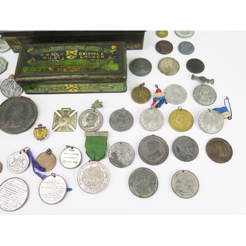 850 - A collection of 19th century and later bronze and metal commemorative medallions contained in two me... 