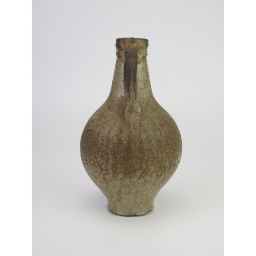 1260 - A 17th century Bellermine bottle, of ovoid form with traditional bearded mask decoration to the neck... 