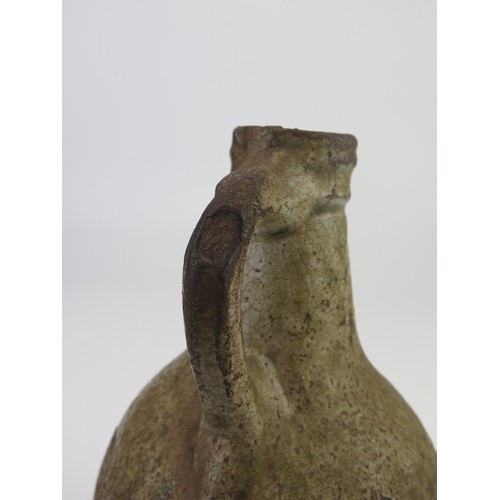 1260 - A 17th century Bellermine bottle, of ovoid form with traditional bearded mask decoration to the neck... 