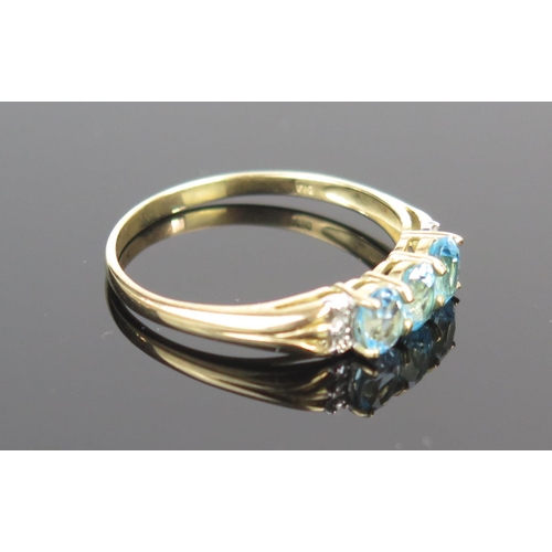 109 - A 9ct Gold, Blue Spinel? and Diamond Dress Ring, size V.75, 2.1g