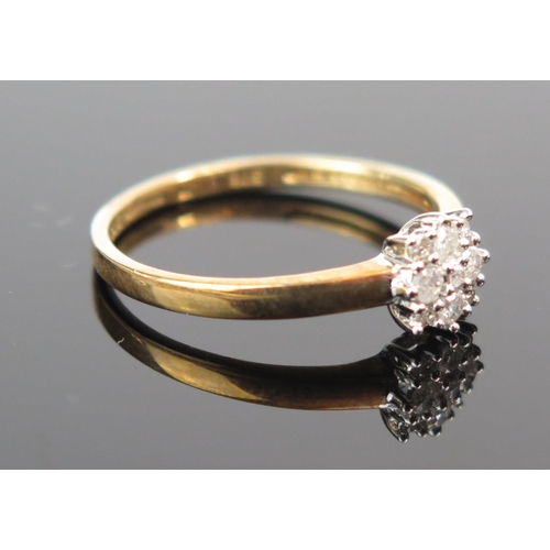 114 - A 9ct Gold and Diamond Cluster Ring, .15ct, size M.5, 1.4g