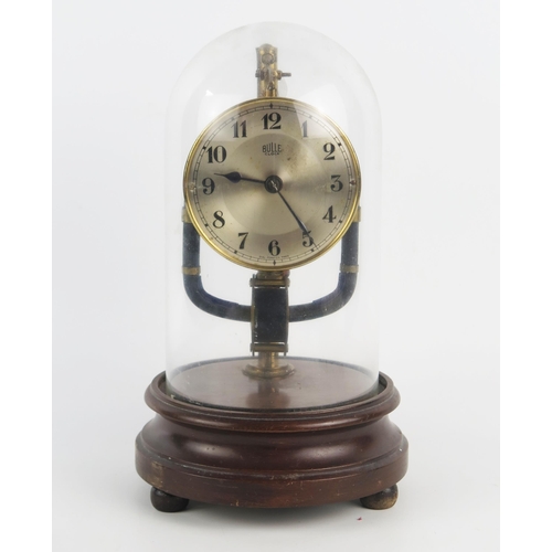 1302 - An early 20th century Boulle electric timepiece, with 9cm silvered Arabic dial, pulse pendulum, moun... 