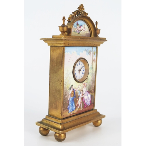 1308 - A Viennese gilt metal and enamel bedside timepiece, of arched outline, the pediment decorated with a... 