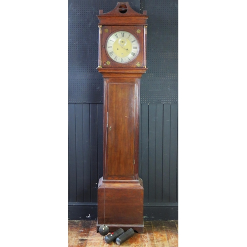 1314 - An early 19th century oak longcase clock, the arched hood with fluted columns, the trunk having a  p... 