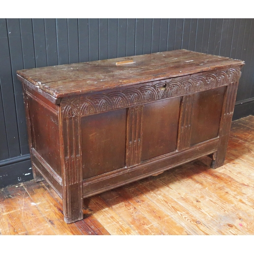 1326 - A late 17th/early 18th century oak coffer of panelled construction, the hinged lid with a moulded fr... 