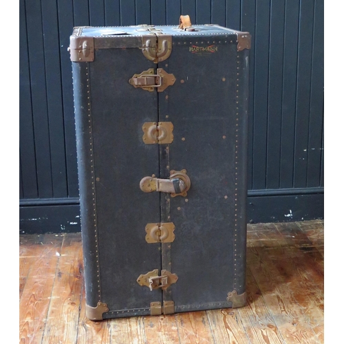 1330 - An American Hartmann metal and canvas bound steamer trunk, with two hinged doors, enclosing four fit... 