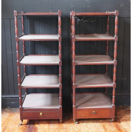 1335 - A matched pair of 19th century mahogany five tier whatnots, each square tier raised on ring turned s... 