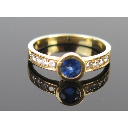 134 - An 18ct Gold, Sapphire and Diamond Ring (c. 4mm sapphire, c. 1.8mm diamonds, size I.5, 2.5g) various... 