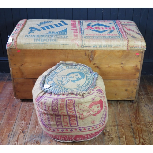 1345 - A stained wood ottoman with printed hessian padded hinged lid, 107cm long, together with a printed h... 