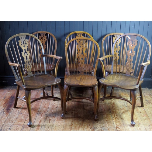 1346 - A set of six elm stick back dining chairs, with pierced central splat, solid seats on turned legs wi... 