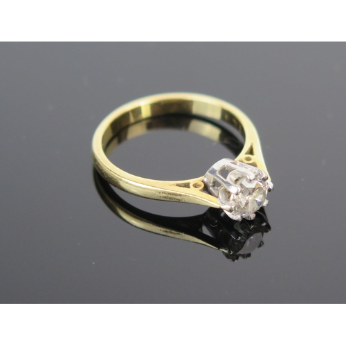 16 - A Modern 18ct Gold and Diamond Solitaire Ring, the claw set brilliant round cut measuring c. 5.3mm, ... 