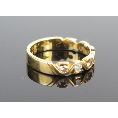 172 - An 18ct Gold and Diamond Seven Stone Half Eternity Ring, c. 3.6mm wide, size L.25, 3.4g