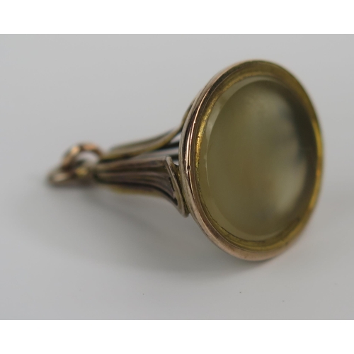 176 - A 19th Century Yellow Metal and Chalcedony Seal, matrix not engraved, c. 29mm drop, 7.5g gross