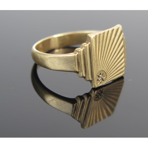 187 - A Gent's 9ct Gold and Diamond Signet Ring with chased ray decoration, size U.5, 4.3g.