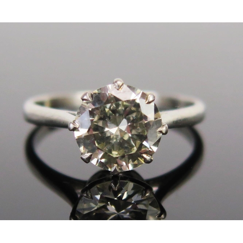 A 1.81ct Brilliant Round Cut Diamond Solitaire Ring in un unmarked platinum or white gold setting. Sold with ANCHORCERT GEM LAB certificate stating estimated weight, VS clarity and N-O colour, 3.23g