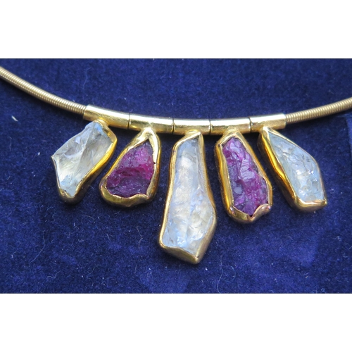 200 - An 18K Gold Handmade Necklace set with natural red and green uncut tourmaline, one of the five drops... 