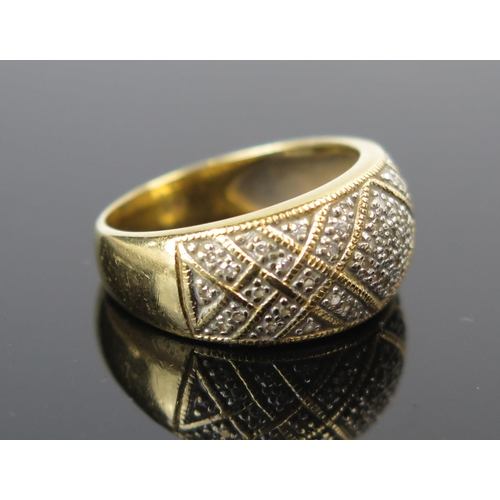 203 - An 18ct Gold and Diamond Ring, 10mm wide head, size M.75, 5.9g