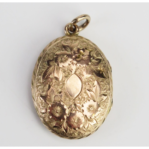 206 - A Yellow Metal Locket with chased foliate decoration, probably 9ct gold F&B, 34mm drop, 4.5g