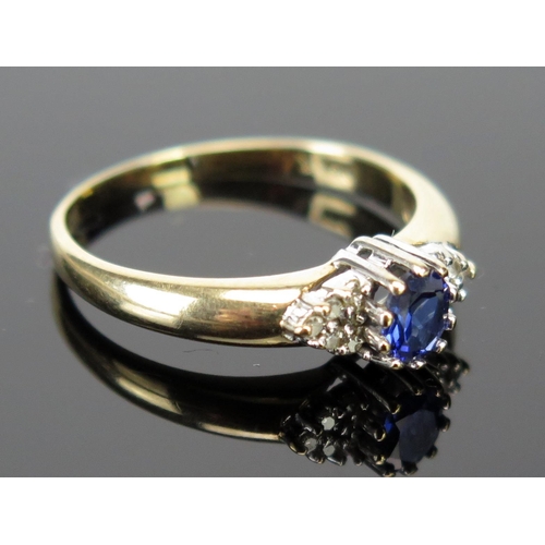 210 - A 9ct Gold, Sapphire and Diamond Ring, c. 5x4.2mm sapphire, full hallmarks, size O.5, 2.1g