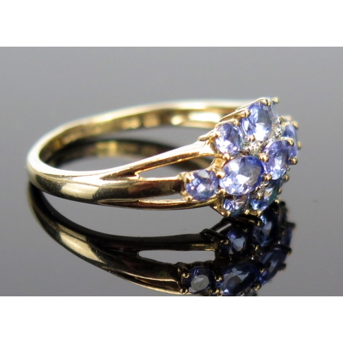 223 - A 9ct Yellow Gold and Tanzanite Ring, 16mm spread, size N, 2.1g