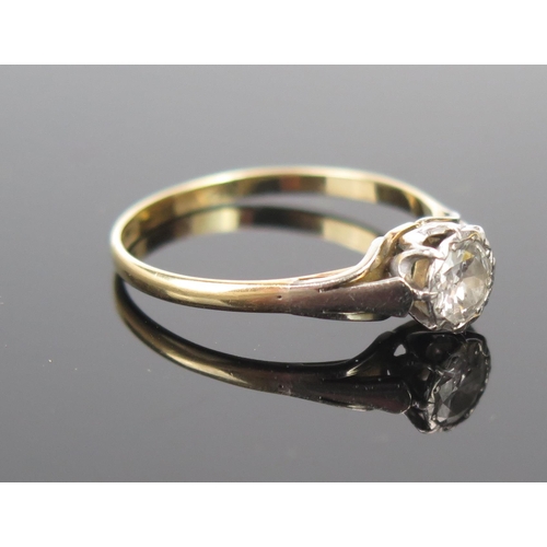 5 - A Diamond Solitaire Ring in an 18ct yellow gold and platinum setting, c. 5.5mm stone, size Q.75, 2.3... 