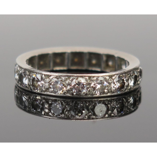 65C - A Good Diamond Full Eternity Ring in a precious white metal setting (probably platinum), c. 3mm ston... 