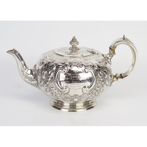 723 - A Victorian silver circular teapot, maker Martin, Hall & Co, Sheffield, 1866, crested and monogramme... 