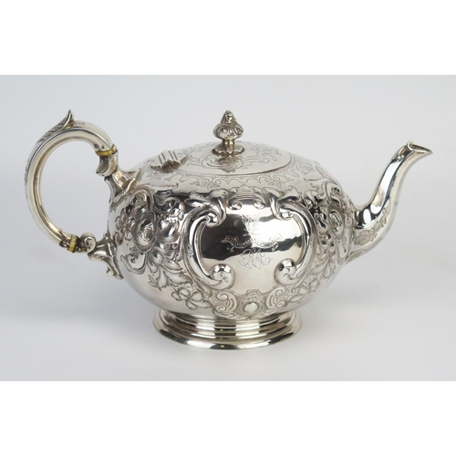 723 - A Victorian silver circular teapot, maker Martin, Hall & Co, Sheffield, 1866, crested and monogramme... 