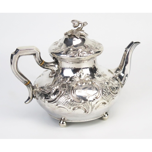 726 - A Victorian silver teapot, maker William Ker Reid, London, 1848, Crested and initialled, of compress... 