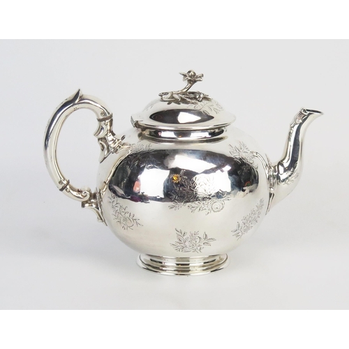 730 - A Victorian silver teapot, maker Robert Garrard II, London, 1871, of globular form with domed hinged... 