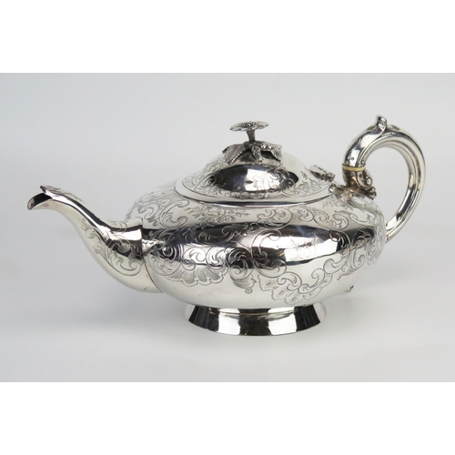 736 - A Victorian silver teapot, maker Charles Lias, London, 1847, of squat circular form, crested and ins... 