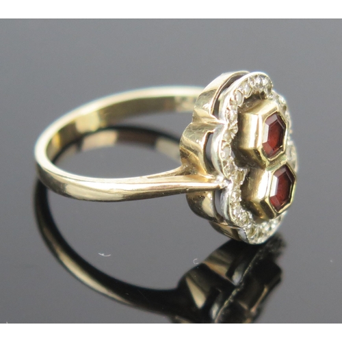 74 - A 9ct Gold and Garnet? Ring, full Birmingham marks, size M.5, 3.2g