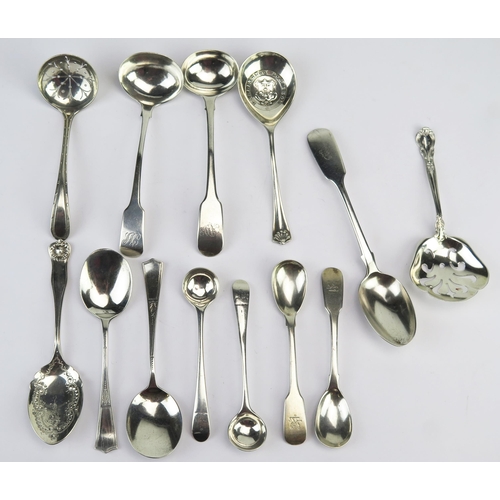 751 - A collection of mixed flatwares, various makers and dates including sauce ladles, mustard, salt and ... 